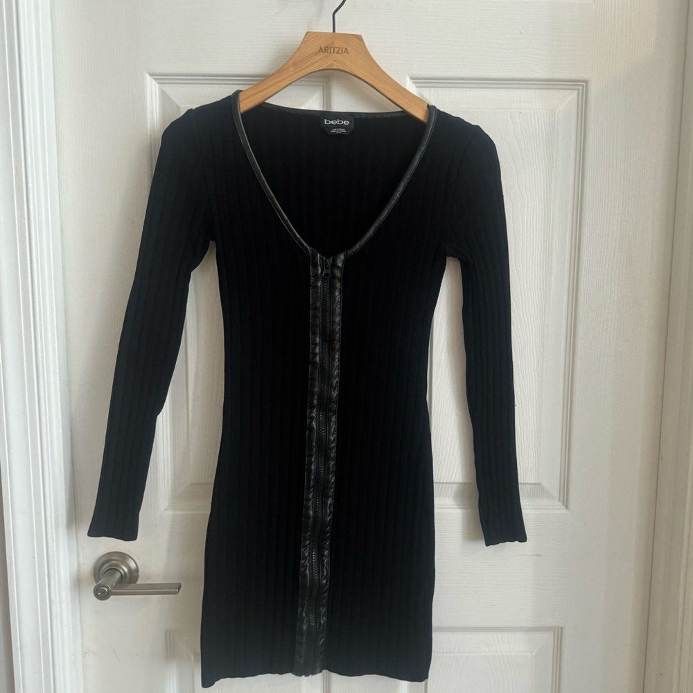 Black long sleeve sweater knit dress by Bebe with zipper down front XS